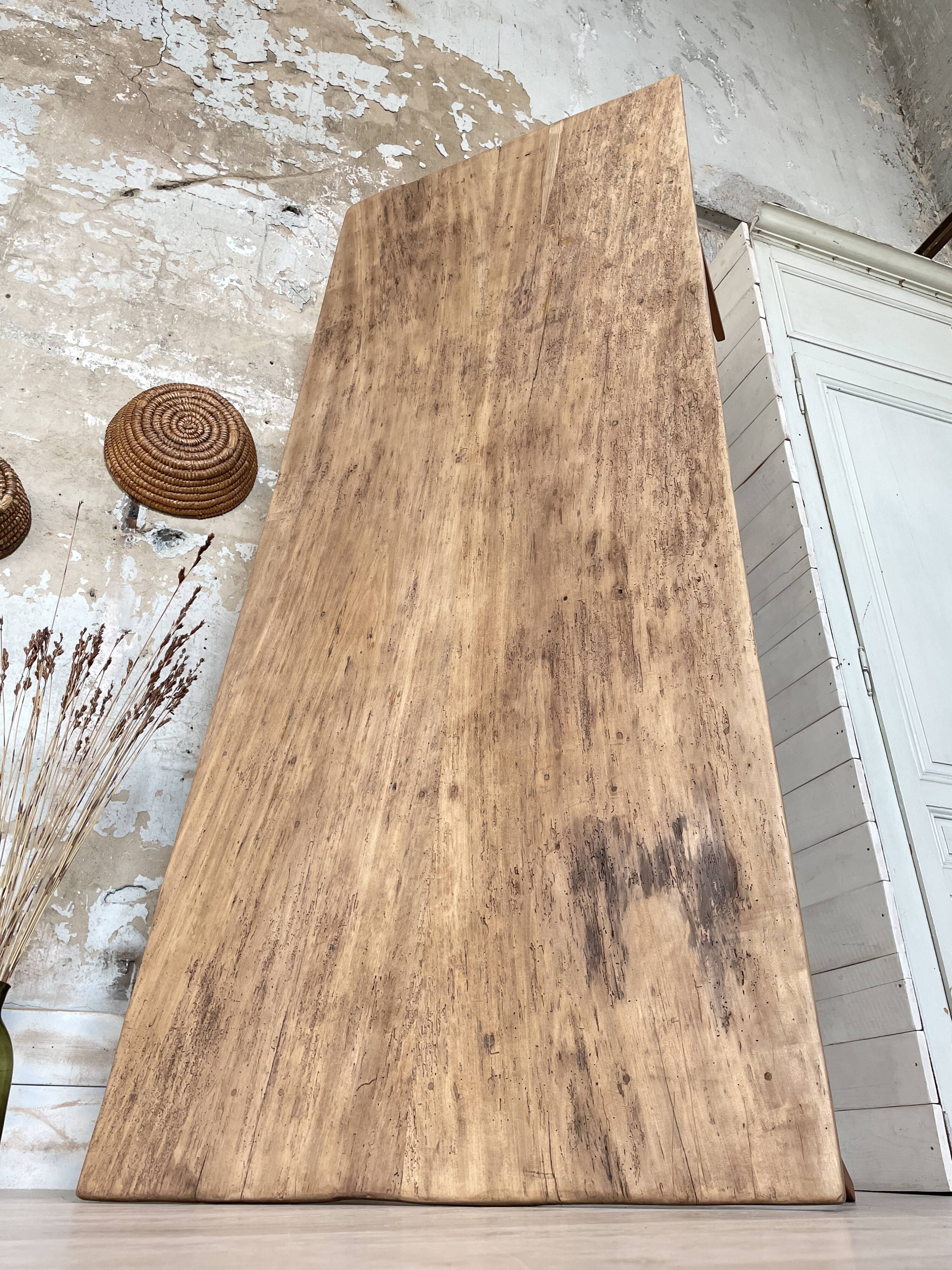Vintage farm table with spindle legs.