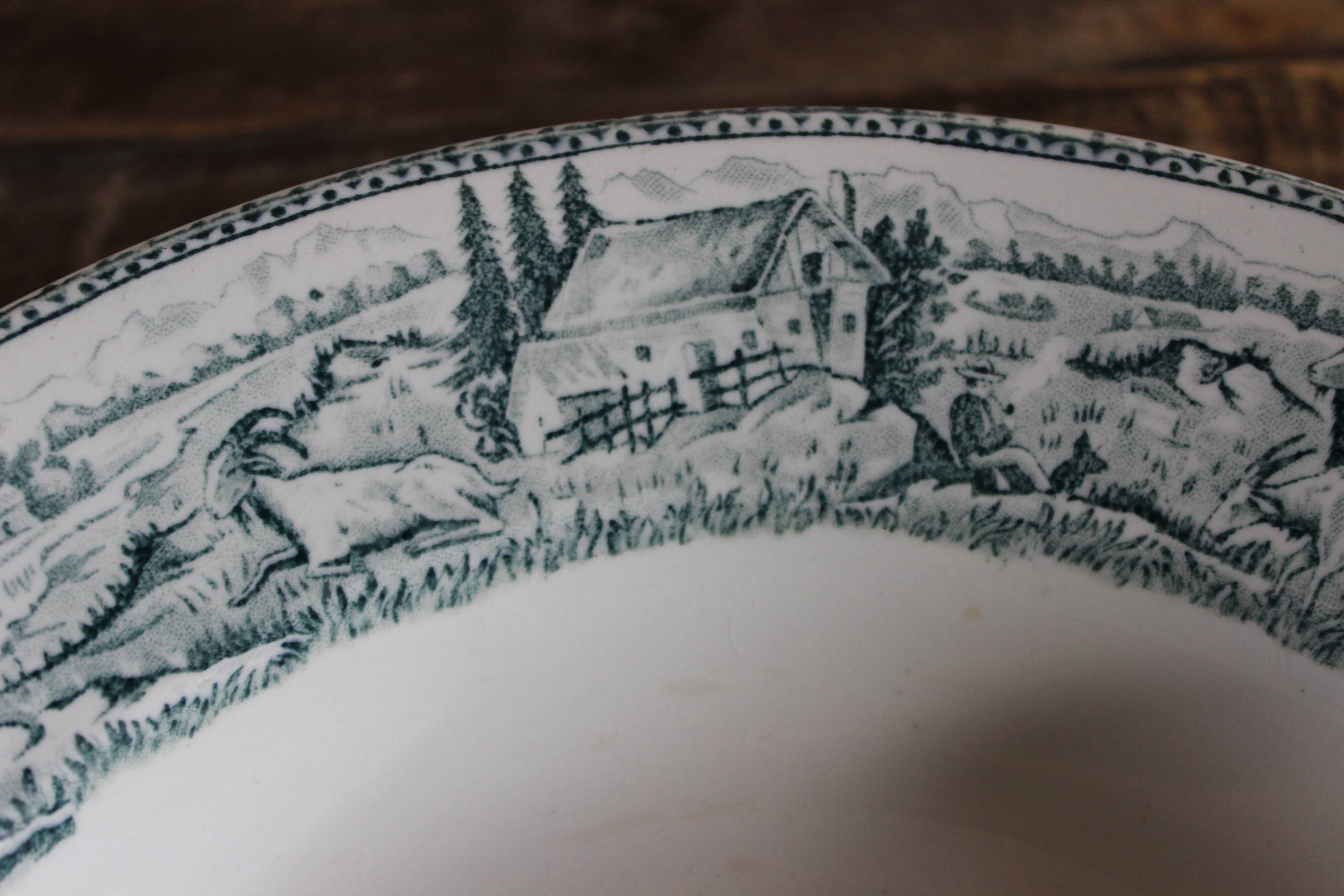 Round hollow dish, Iron earth, Saint Amand, milkmaid model, goat decoration