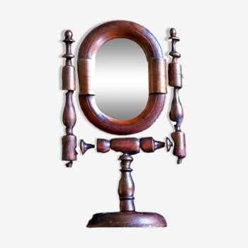 Ancient psyche turned wooden swivel table mirror