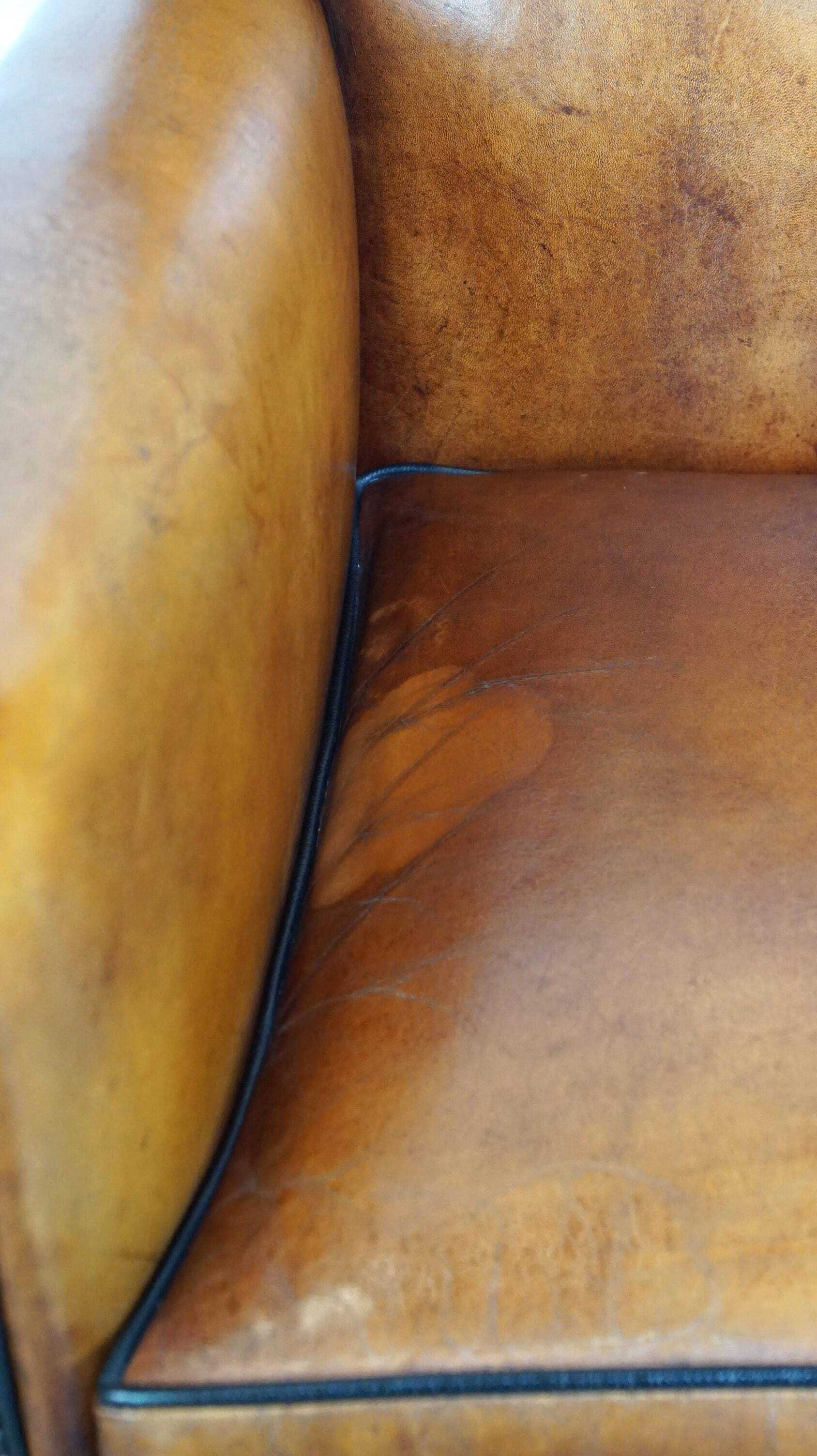 Sleek sheepskin Art Deco design armchair with beautiful details