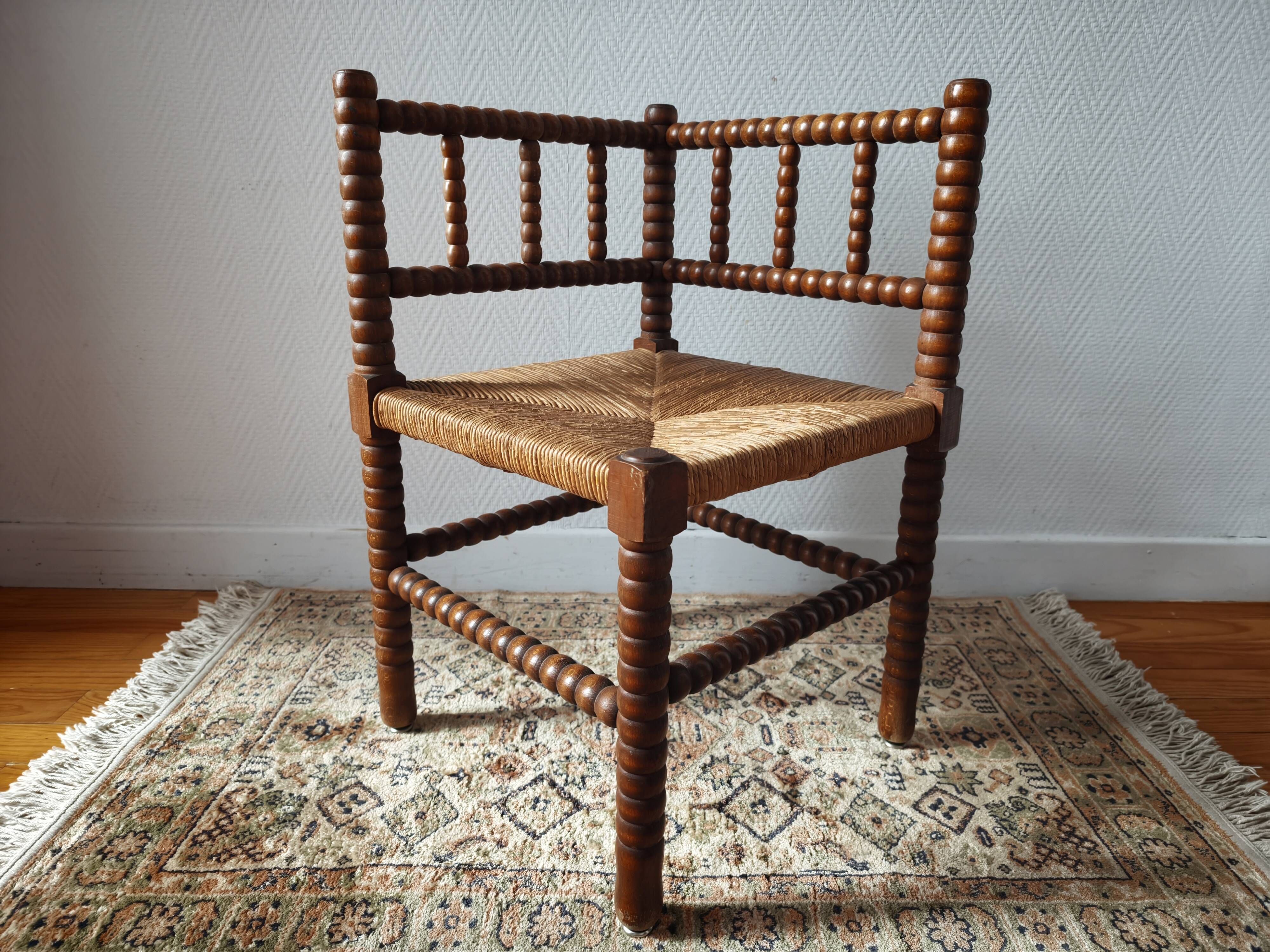 Chaise vintage coin du feu en bois tourné bobine