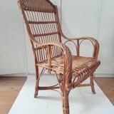 High-backed wicker armchair