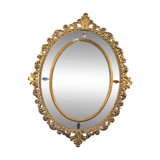 Miroir ovale en bois doré