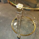 Round table in glass and brass and acrylic columns, 1980