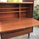 Vintage Scandinavian secretary in rosewood with drawers featuring fin-style handles.