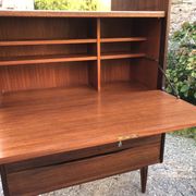 Vintage Scandinavian secretary in rosewood with drawers featuring fin-style handles.