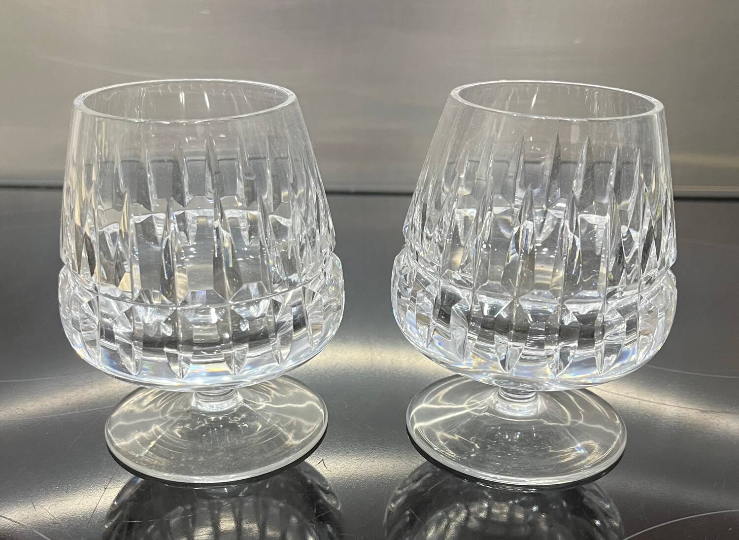 2 cut crystal alcohol glasses