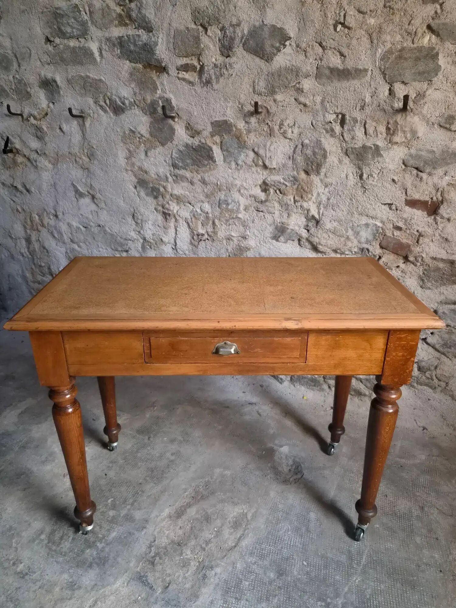 Vintage beech desk with a linoleum top and drawer.