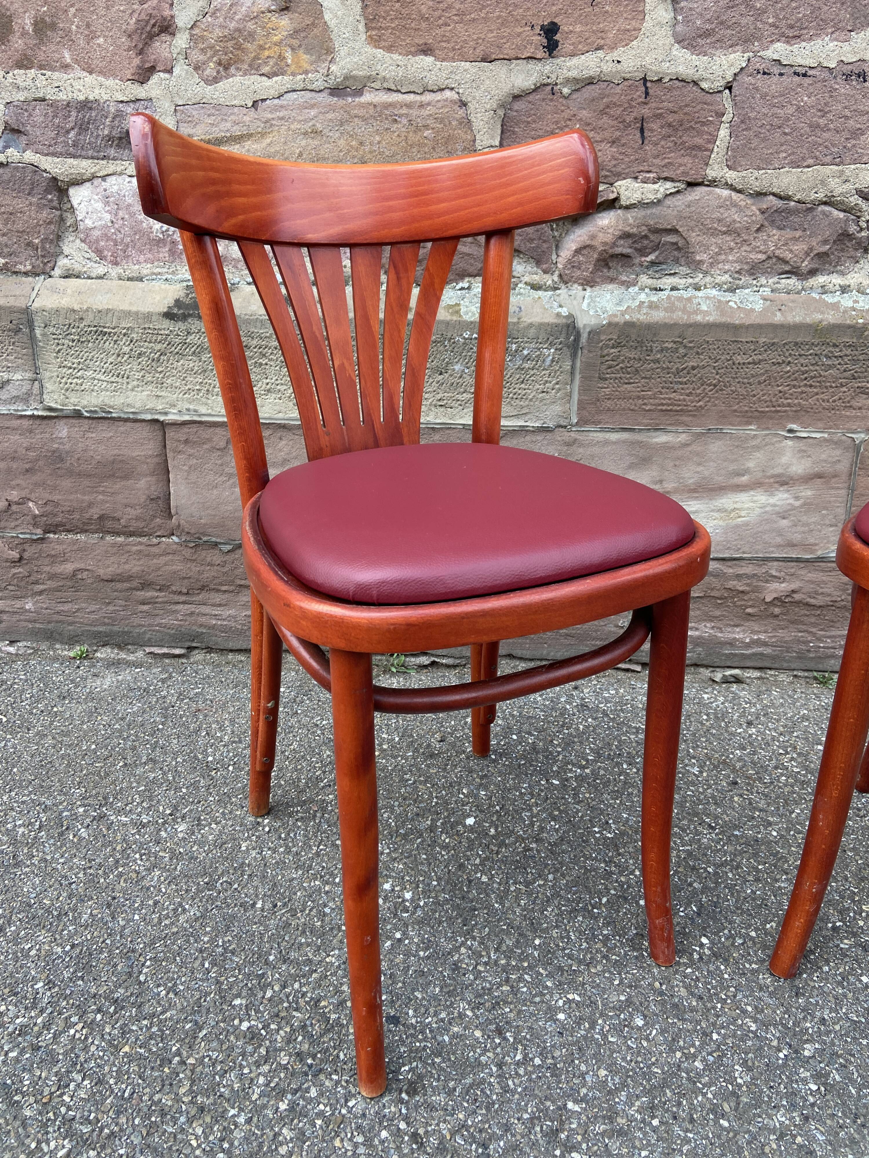 Pair of Alsatian bistro chairs in wood and leather, 1960