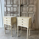 Pair of Louis XVI style bedside tables in white lacquered wood