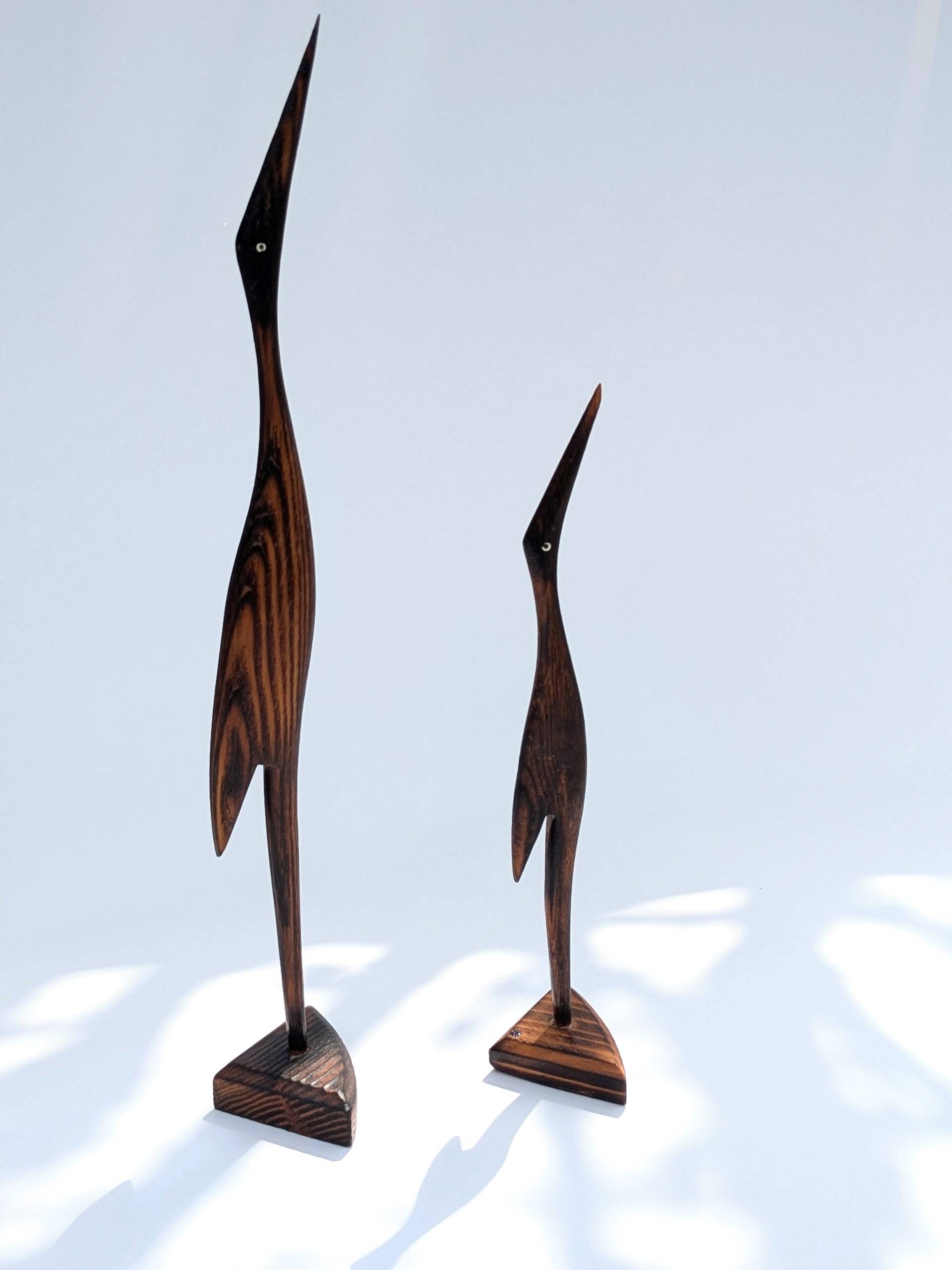 Paire de grues en bois, années 60