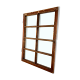 Vintage wooden window converted to a mirror