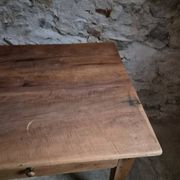 French antique dining table in cherry wood with two drawers, circa 1880–1920.