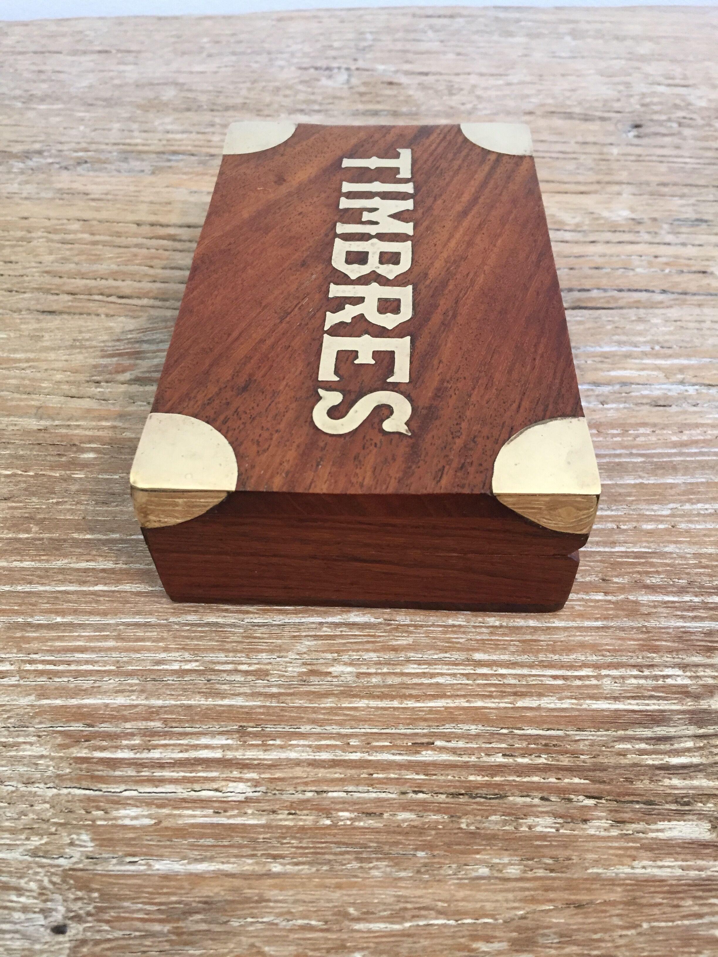 Small cabinet in walnut and brass