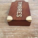 Small cabinet in walnut and brass