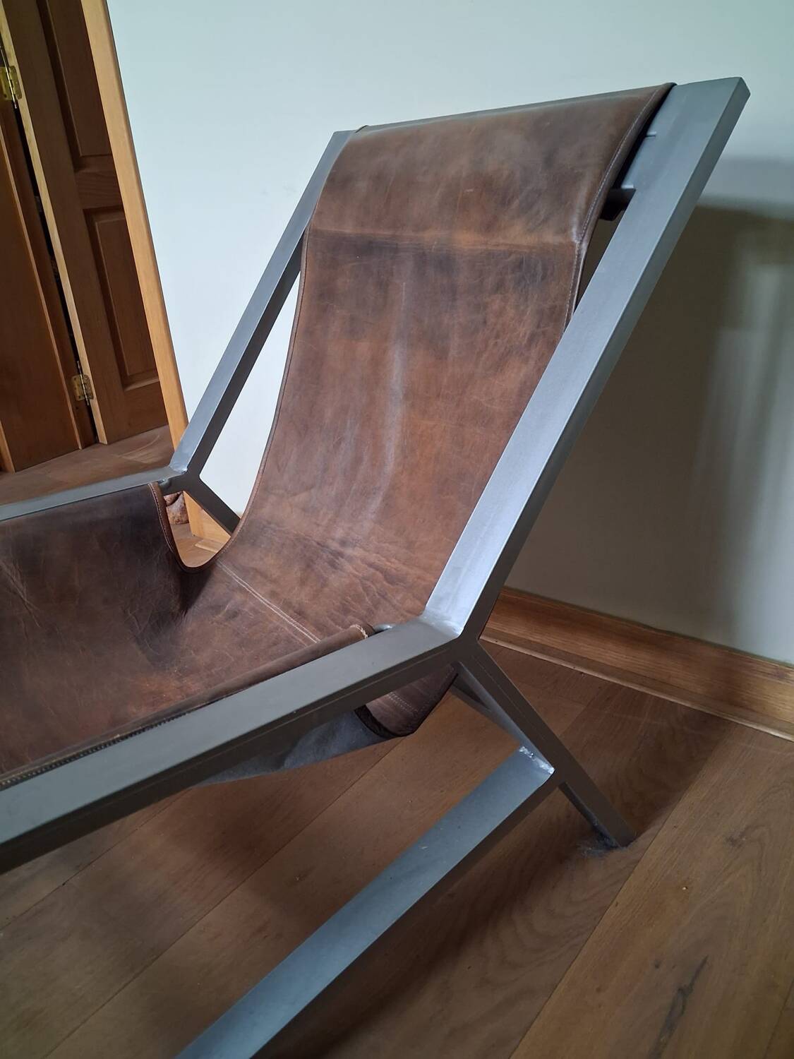 Brown leather armchair, J-Line