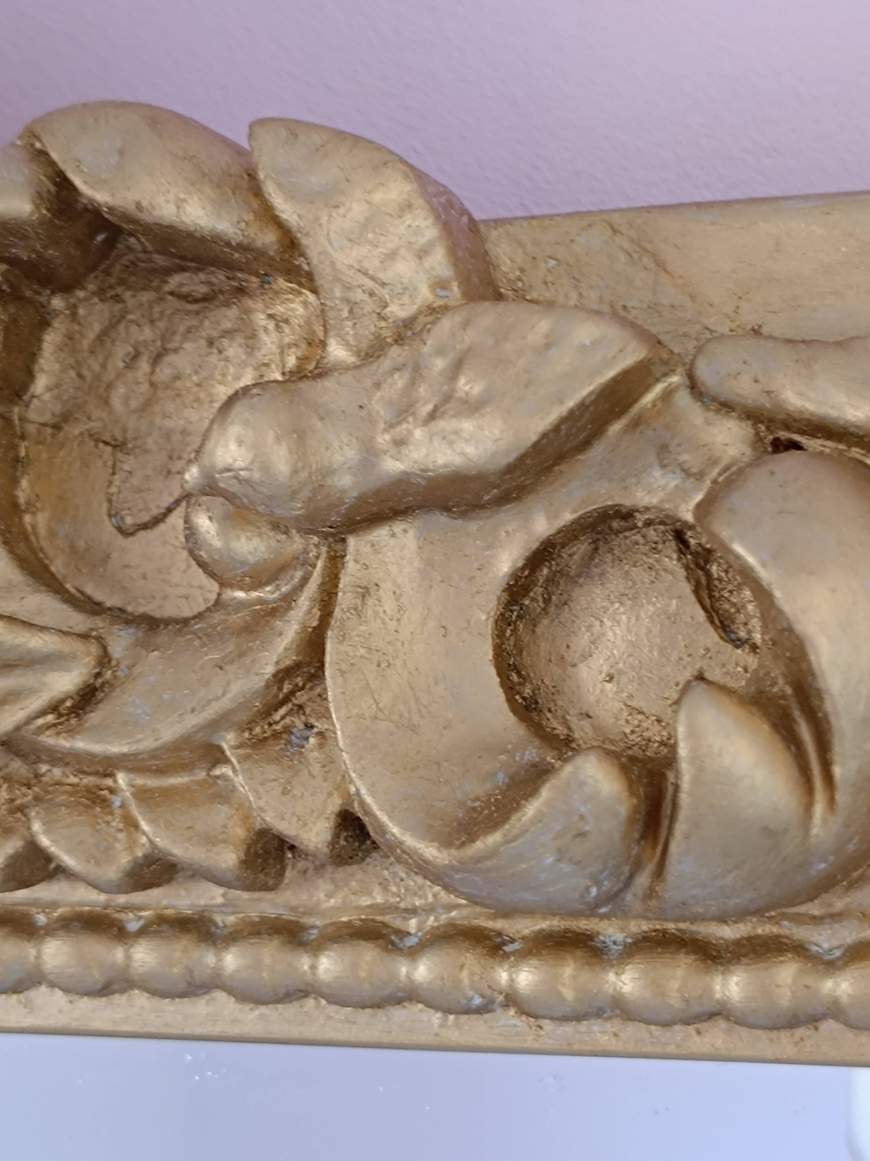 Gilded mirror with a Louis Philippe style pediment