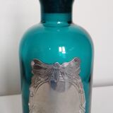 Flacon en verre et son bouchon bleu turquoise