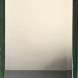 Beveled mirror and varnished wooden frame