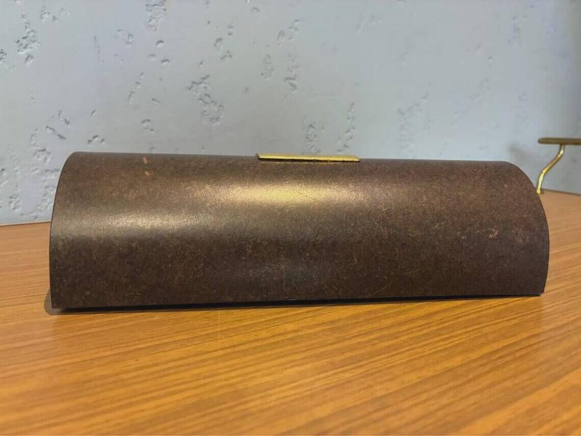 Pair of Menzel Leuchten cylindrical wall lights, brass details, 1990s