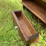 Old carved wooden medicine cabinet with beveled mirror