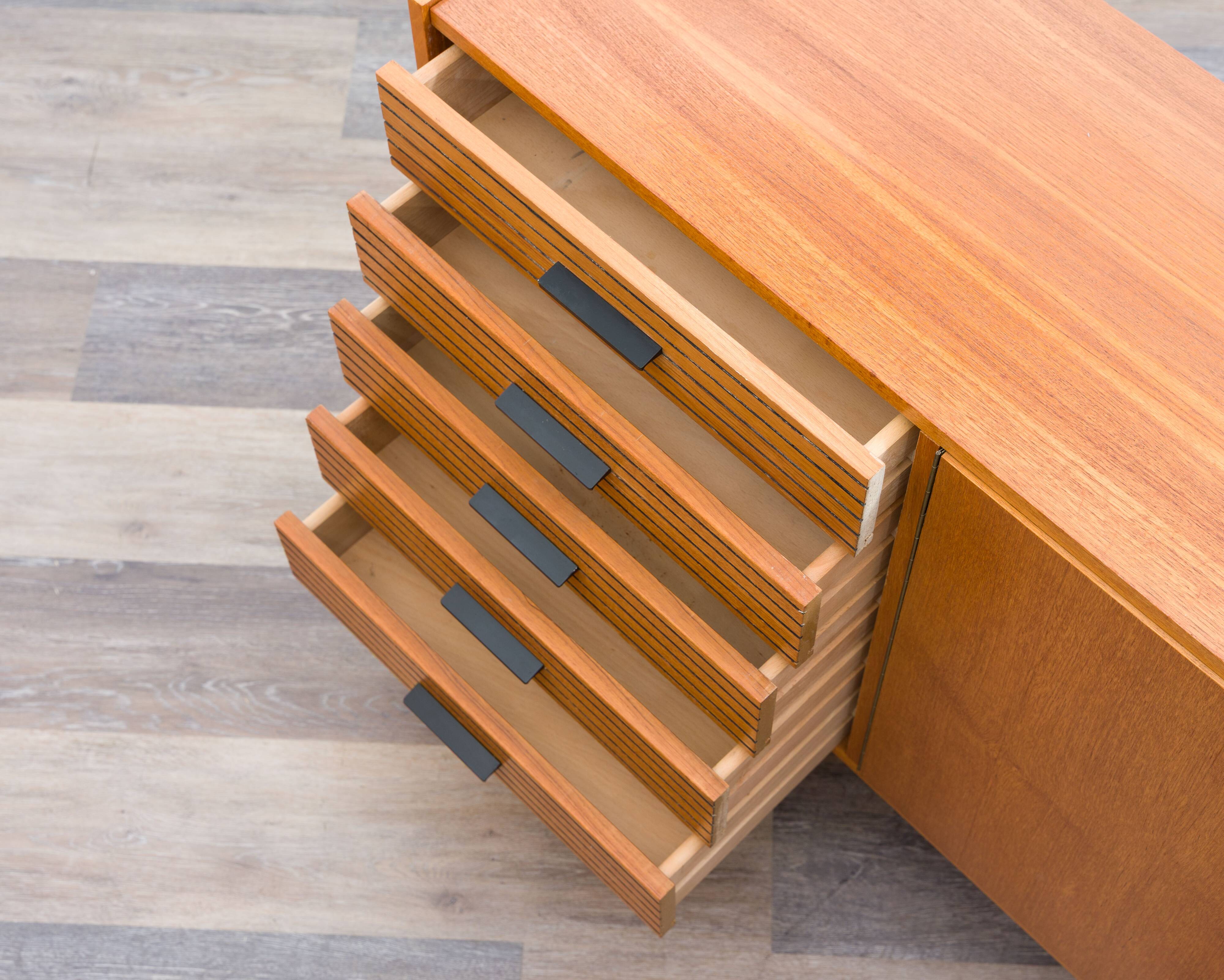 Teak sideboard with grooved drawers, 1960s.