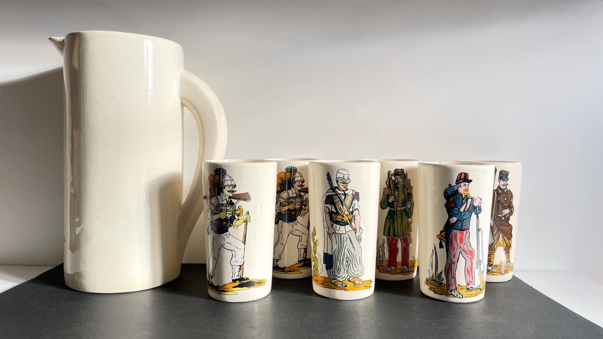 Orangeade service to vintage ceramic soldiers