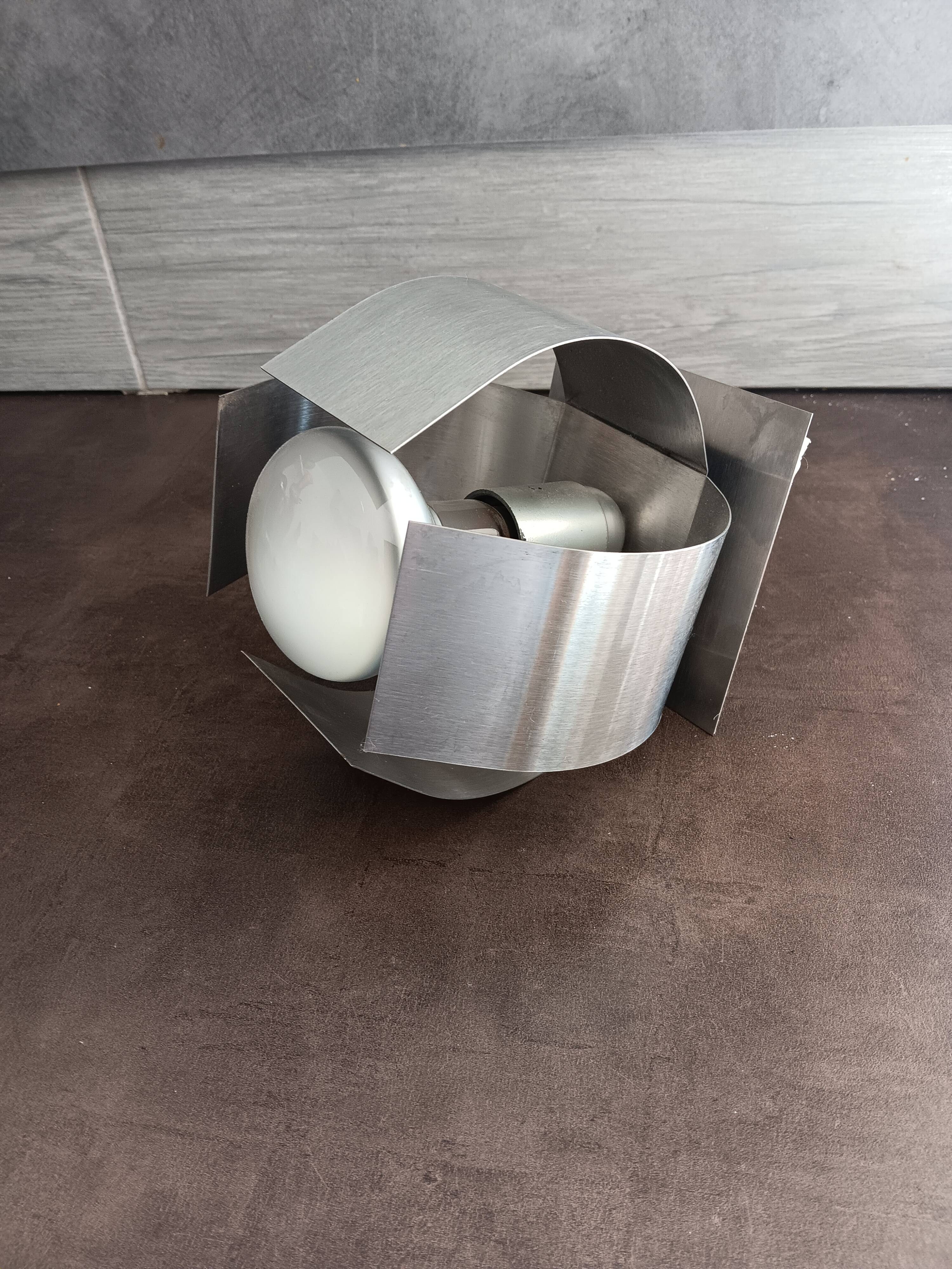 Stainless steel wall light from the 70s