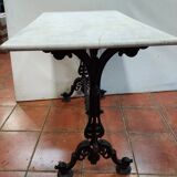 bistro table with cast iron base and marble top