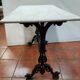 bistro table with cast iron base and marble top