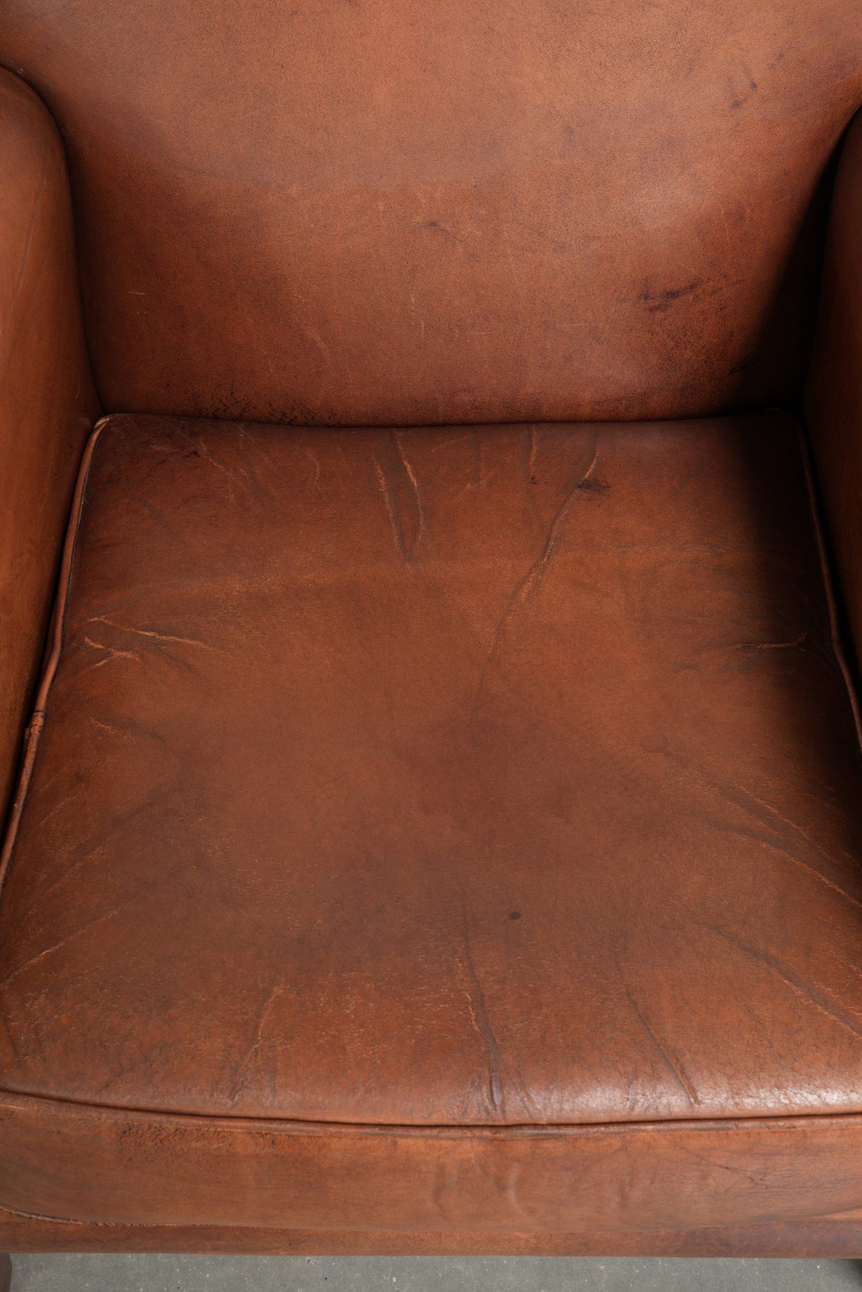 Comfortable set of sheepskin armchairs with and a timeless design
