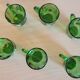 Set of 6 dark green liqueur glasses with handle and floral decoration.