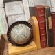 Pair of greenhouses vintage wooden books world map