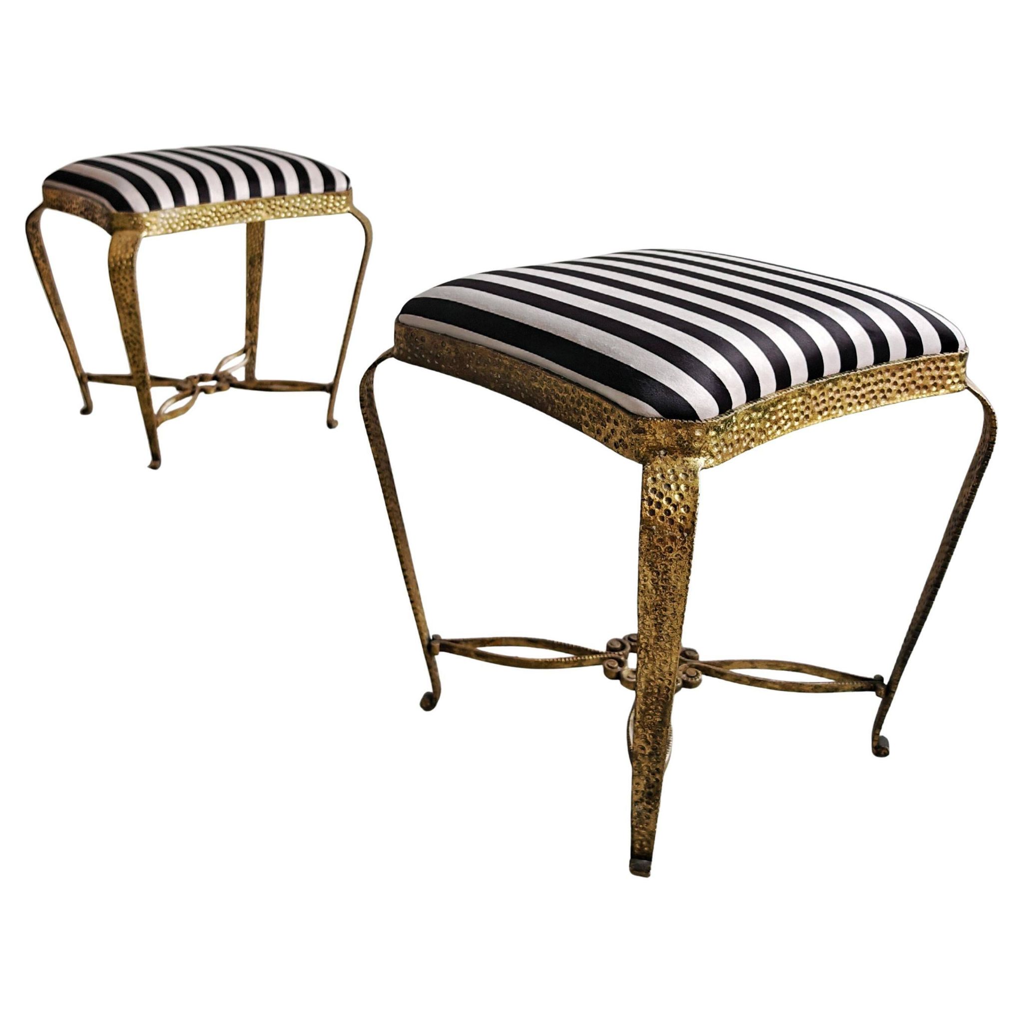 Pair of Mid Century Modern ottomans by Pier Luigi Colli from the 1950s.