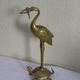 Heron in brass on the back of a turtle, press paper, vintage 1970