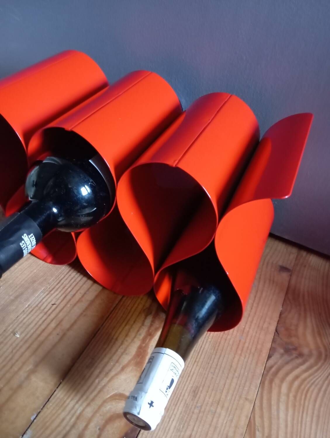 Red painted metal bottle holder, vintage 1980
