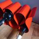 Red painted metal bottle holder, vintage 1980
