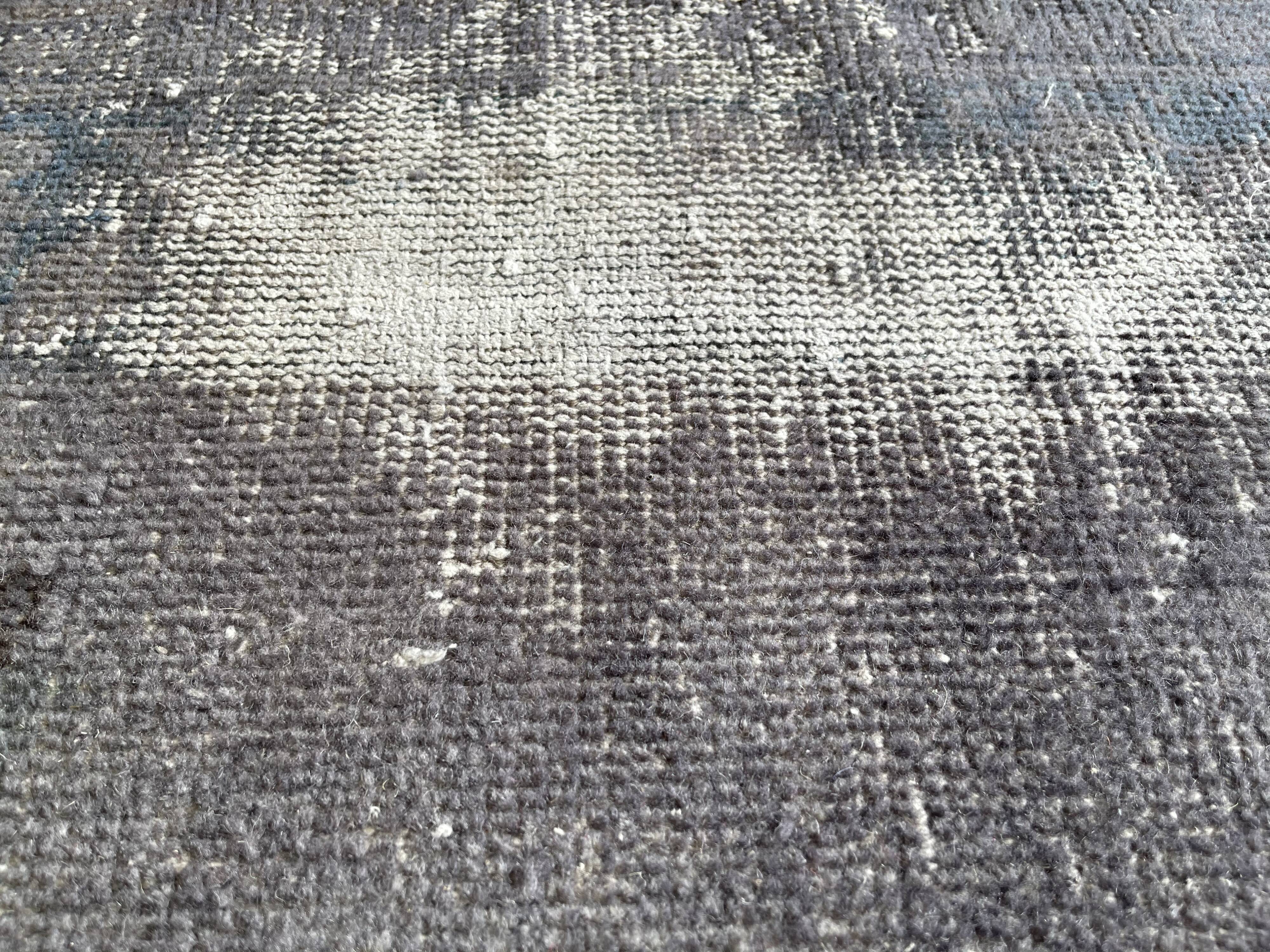 Distressed turkish rug 111x78 cm wool vintage rug, over-dyed gray