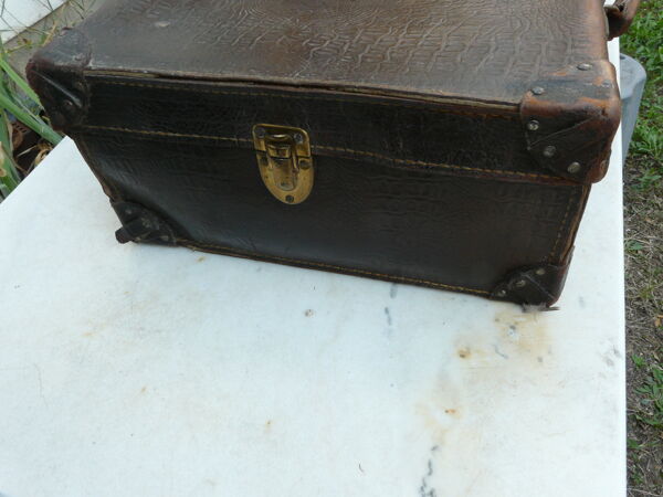 Valise en cuir marron intérieur tissu