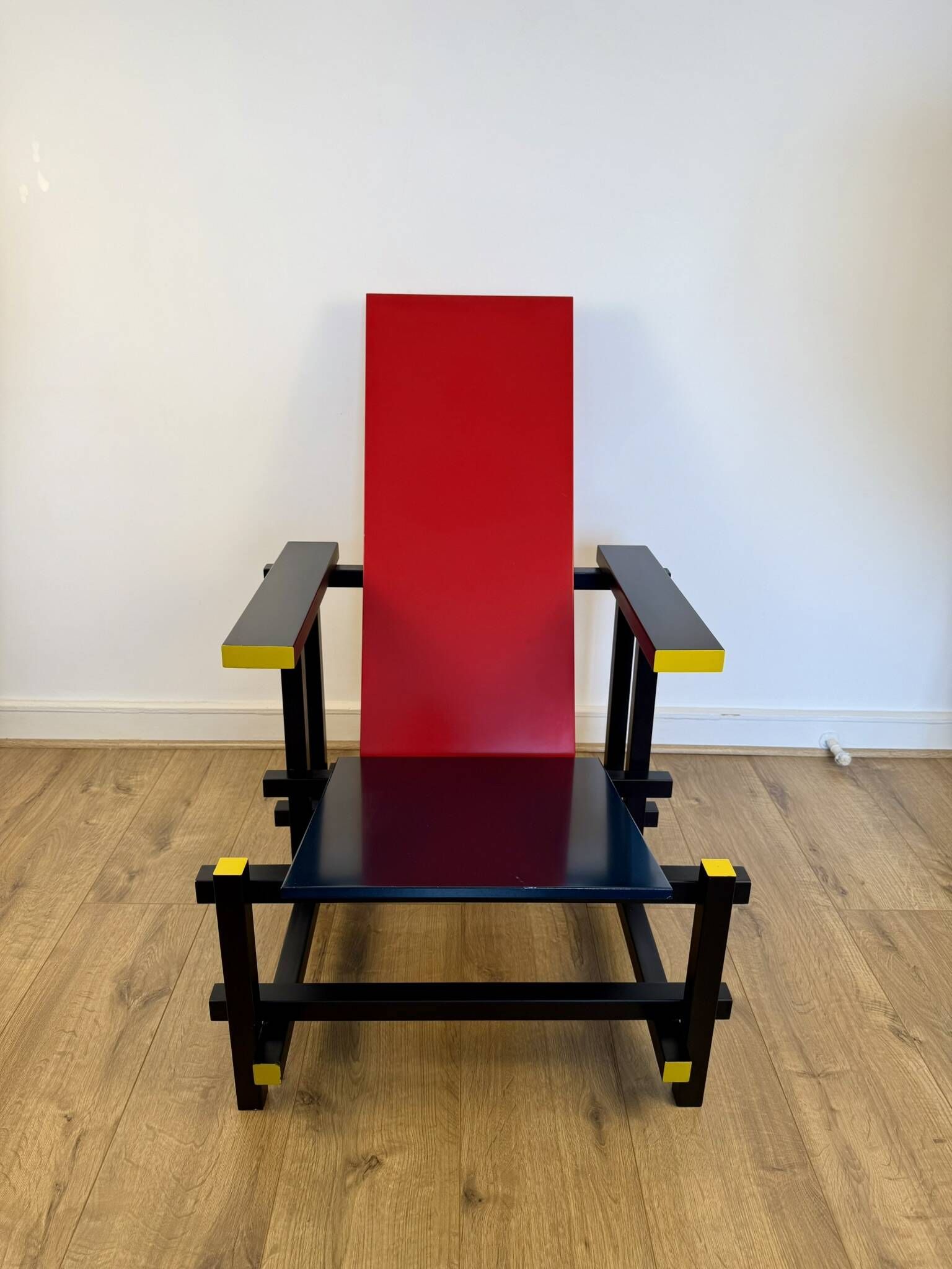 Red and Blue Chair in the Style of Gerrit Rietveld – De Stijl Movement
