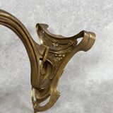 Art Nouveau wall sconces with opalescent iridescent glass