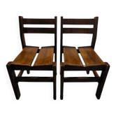 Pair of solid elm chairs, Maison Regain style.