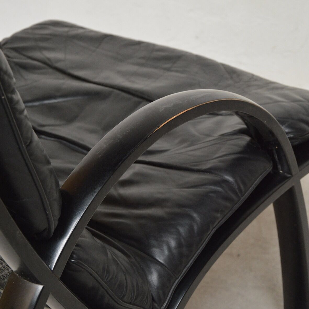 Black leather armchair and canning