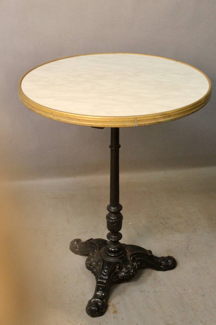 Bistro table with cast iron base