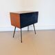 Vintage workshop furniture with 15 blue drawers.