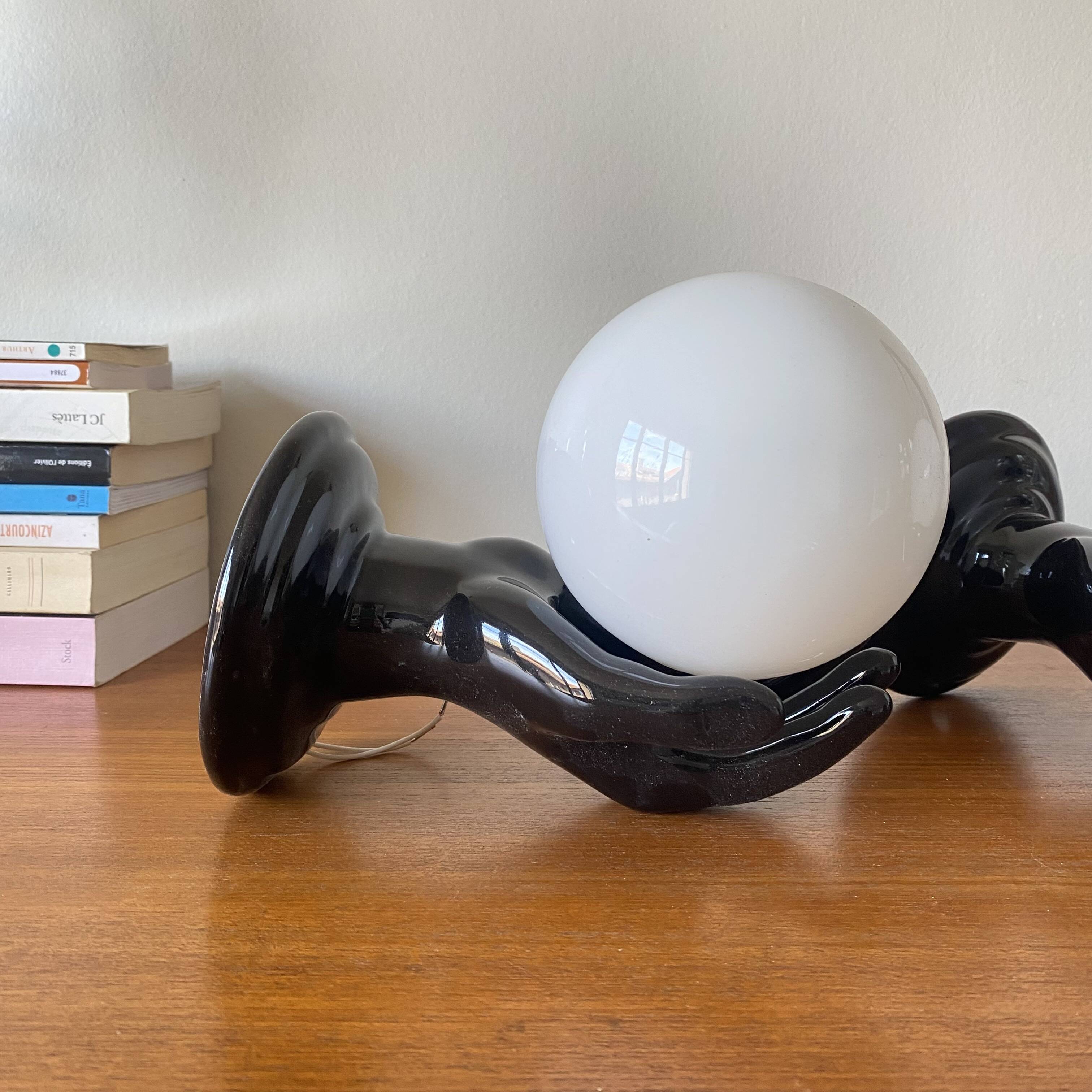 Pair of black ceramic wall lights from the 70s and 80s.