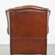 Sheepskin leather wingback chair with patina