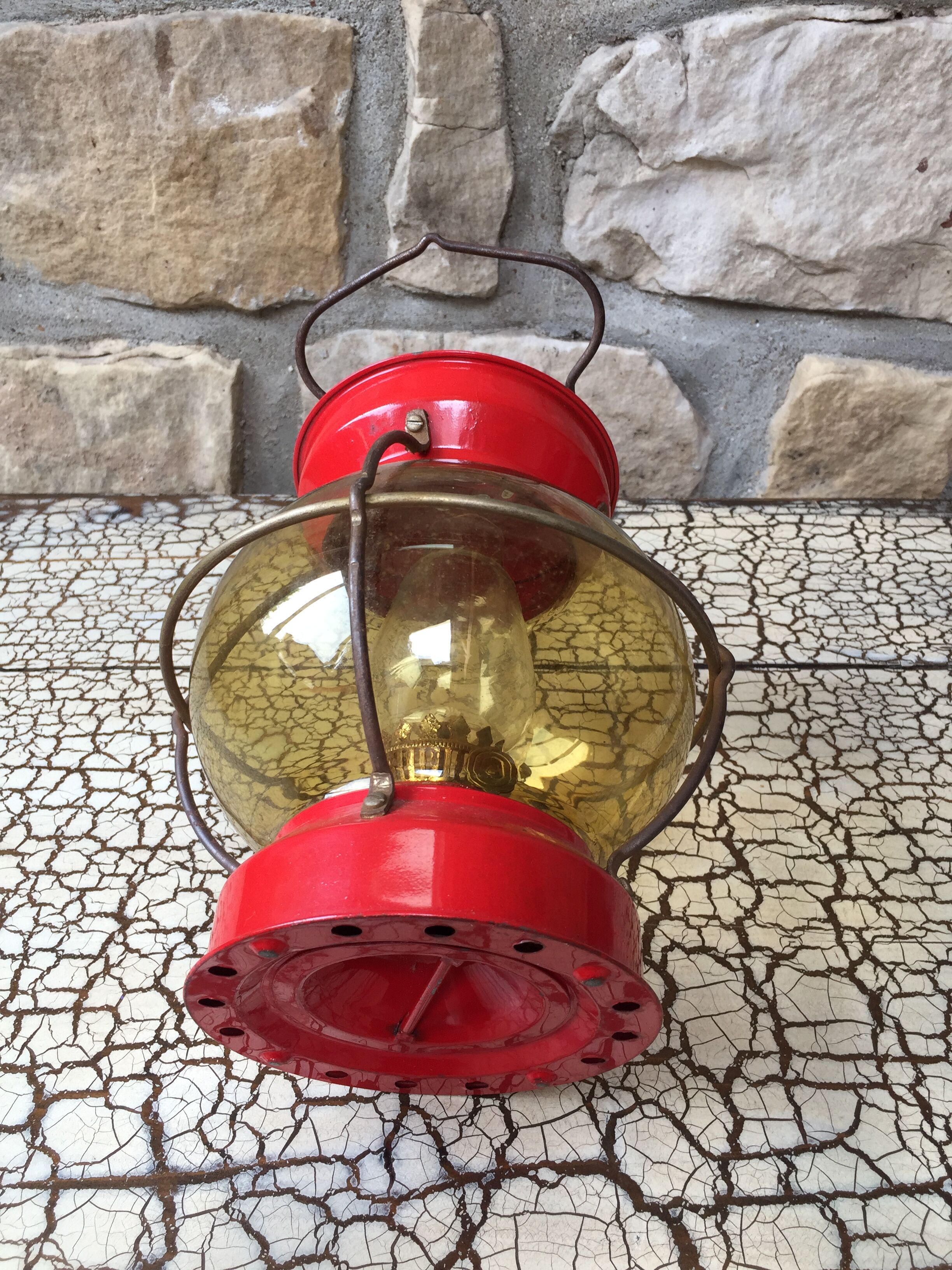 Vintage round glass and metal storm lamp