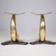 Solid brass dolphin console feet.