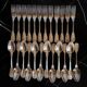 24 silver-plated metal table settings in the filet model.